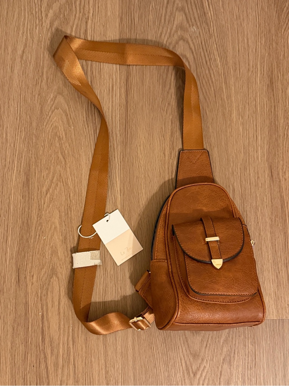 Le Bag Brown Faux Leather Sling Backpack Crossbody Bag Adjustable Strap NWT